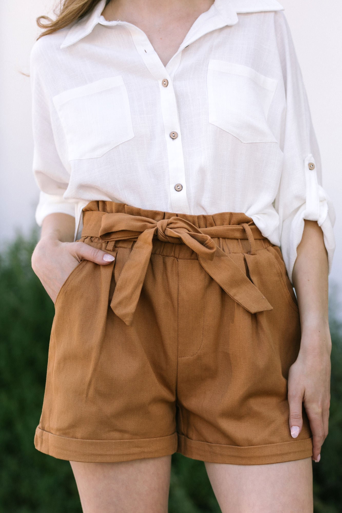 high waisted brown shorts outfit