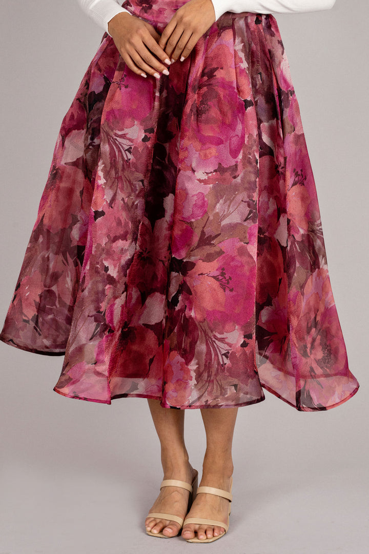 Vibrant floral-print midi skirt with a voluminous silhouette and a high waistline.