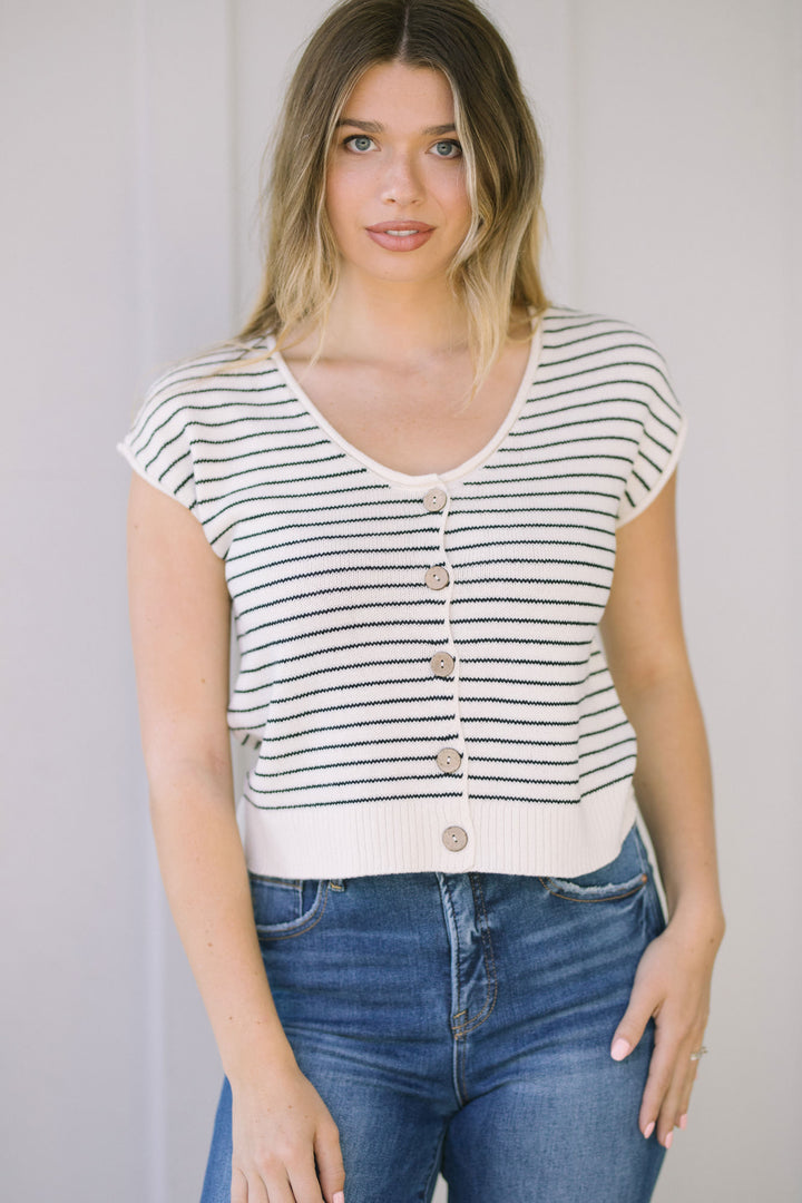 A striped short-sleeve knit cardigan with a scoop neckline, button-down front, and raw edge trim.