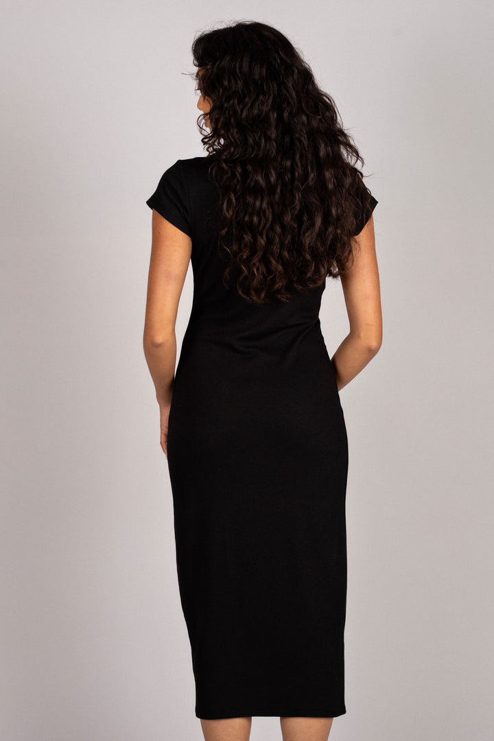 A black midi dress with a fitted silhouette and short sleeves, featuring a V-neckline and a streamlined design.