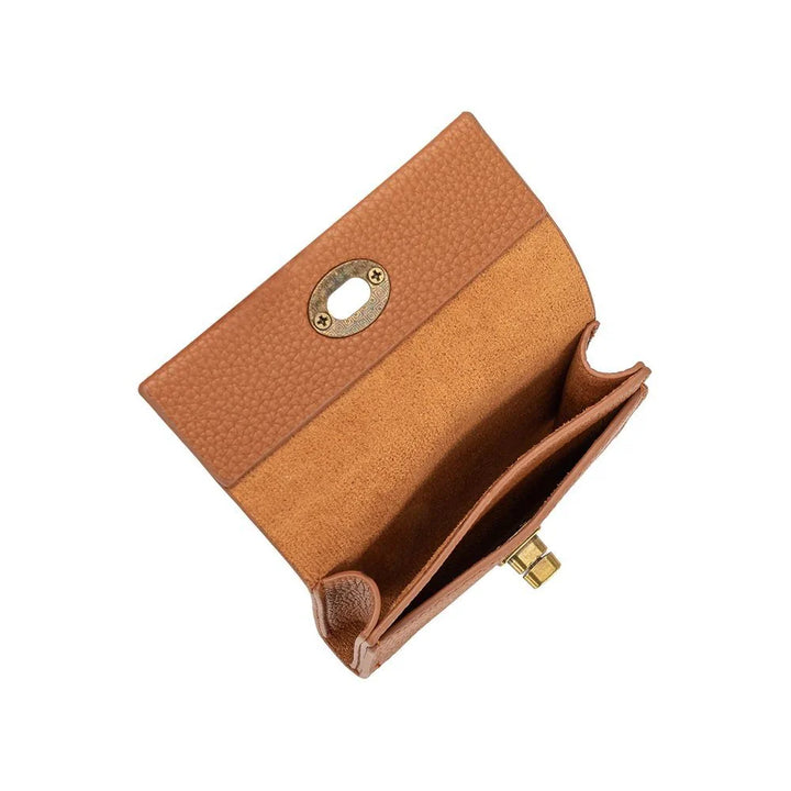 Tan vegan leather wallet with turn-lock closure, brass hardware, and two card slots.