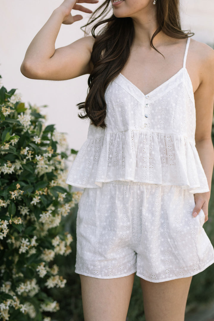 Jojo Eyelet Peplum Top