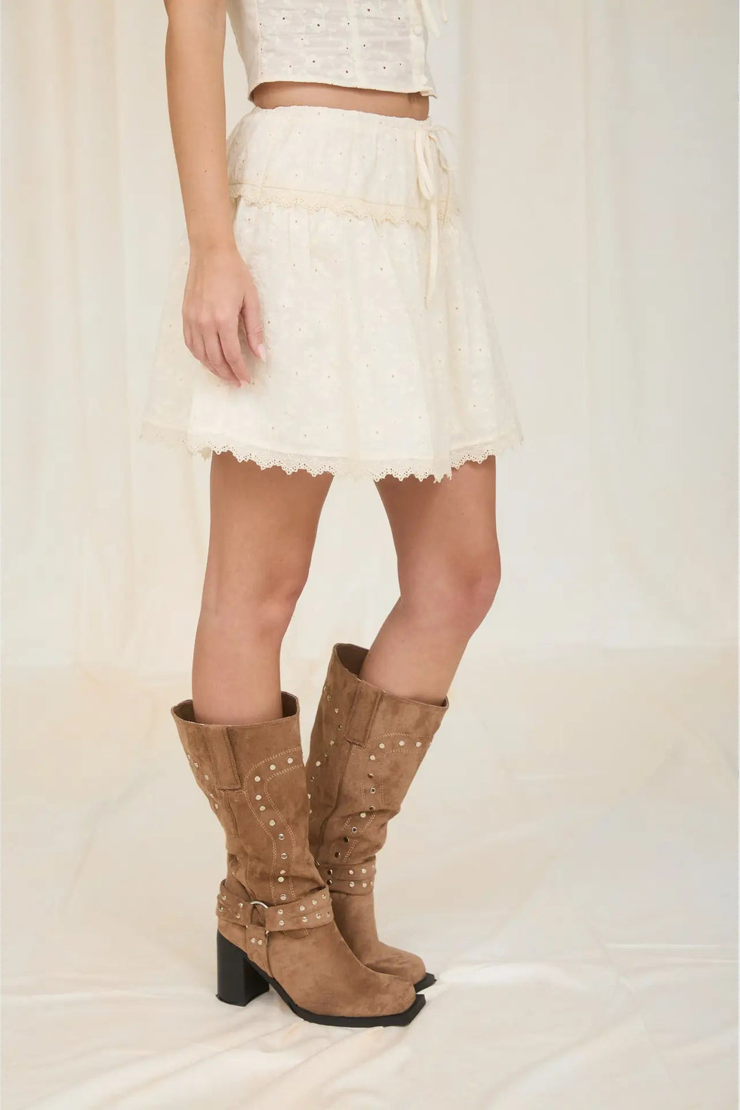 lace top and skirt set and brown boots 