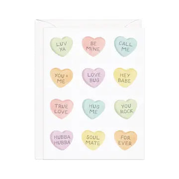 Colorful candy heart-shaped greeting cards with romantic messages like "Luv Ya", "Be Mine", and "You & Me".