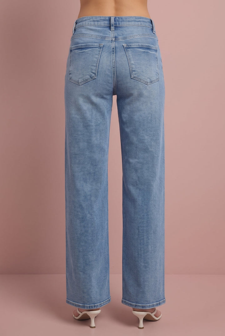 Light blue straight-leg jeans, back view, on pink background.