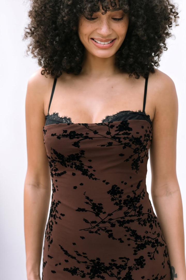 Charlotte Floral Mesh Dress in brown with black floral print, front view on model.