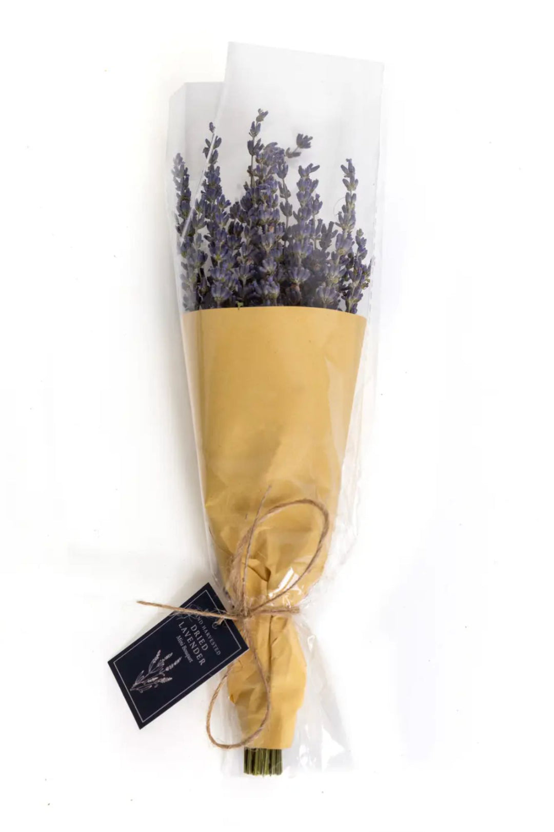 A bouquet of dried, vibrant purple lavender stems wrapped in a yellow paper cone and tied with twine, accompanied by a black label.