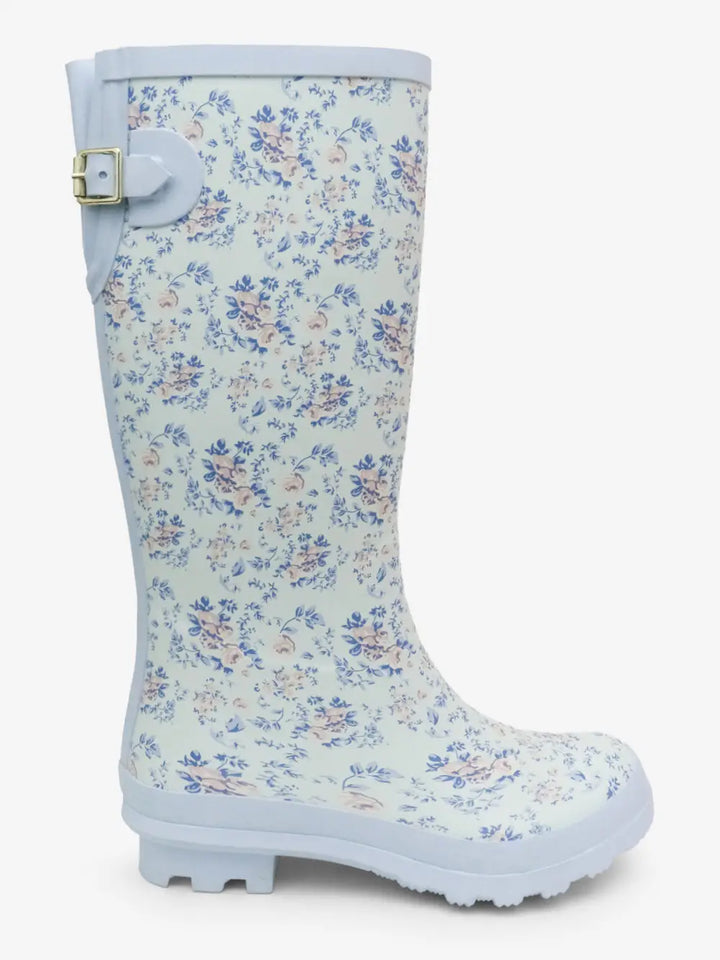 Gigi Floral Rain Boots with white background, featuring a delicate floral print in shades of blue and pink on a pale mint base, accented by a brass-tone buckle detail.