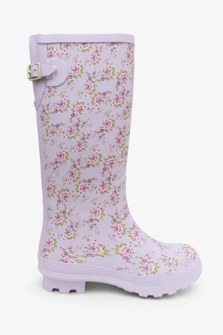 Lavender rain boots with a delicate floral print, featuring a buckled strap for a touch of feminine style.