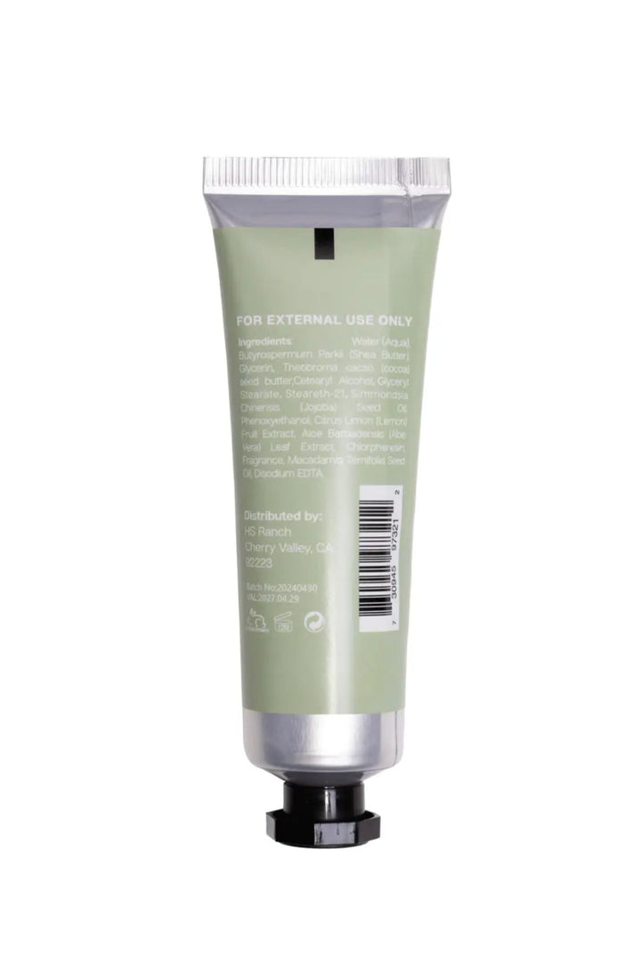A pale green 1-oz tube of floral-scented hand cream with a pump dispenser, designed to nourish and hydrate the skin.