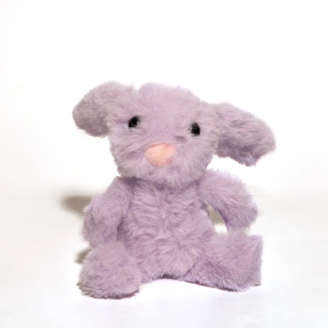 Soft, plush lavender-colored bunny keychain with large black eyes and a peach nose.