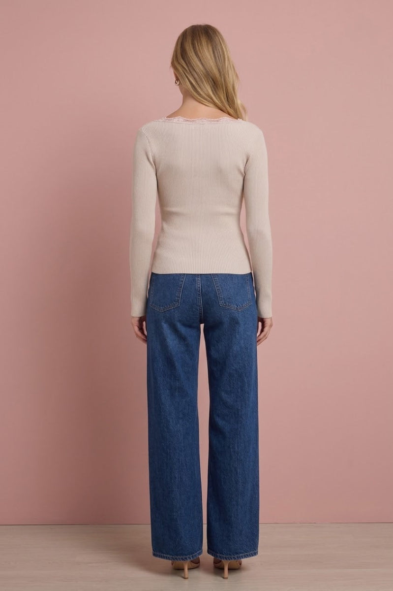 Leslie Square Neck Knit Top in cream, back view on model wearing blue jeans.