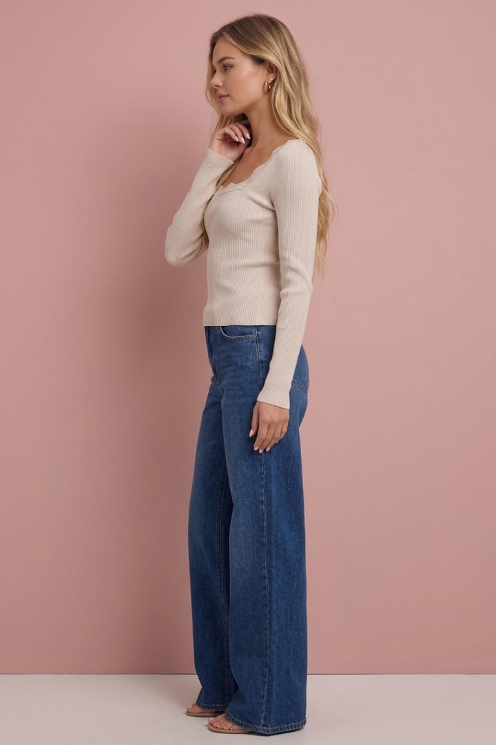 Leslie Square Neck Knit Top in cream, paired with blue jeans, side view.