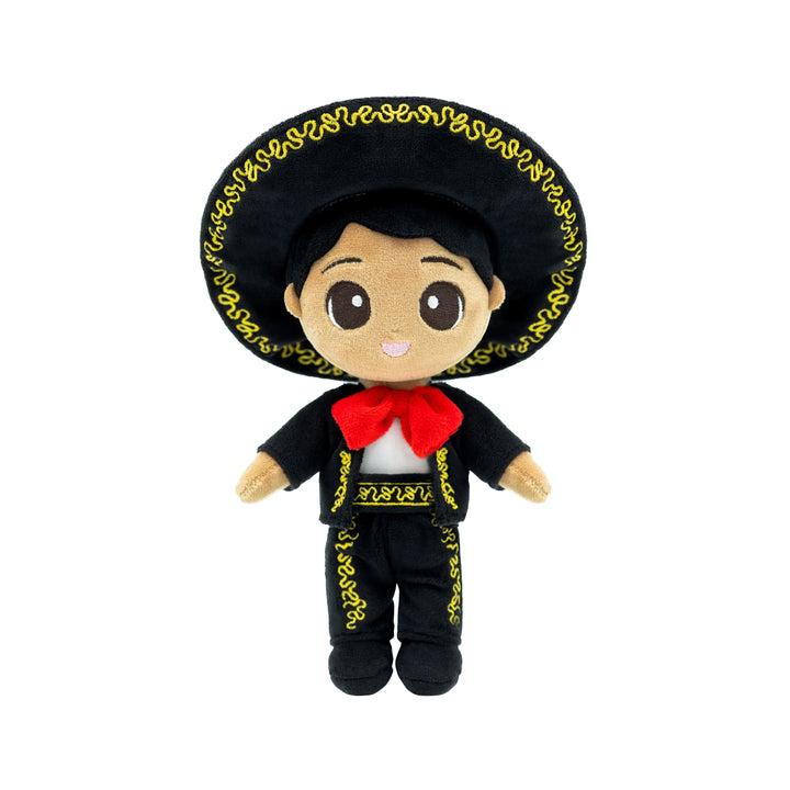 A plush doll wearing a traditional Mexican-inspired costume with a large black sombrero, black outfit with gold embroidered designs, and a red scarf.