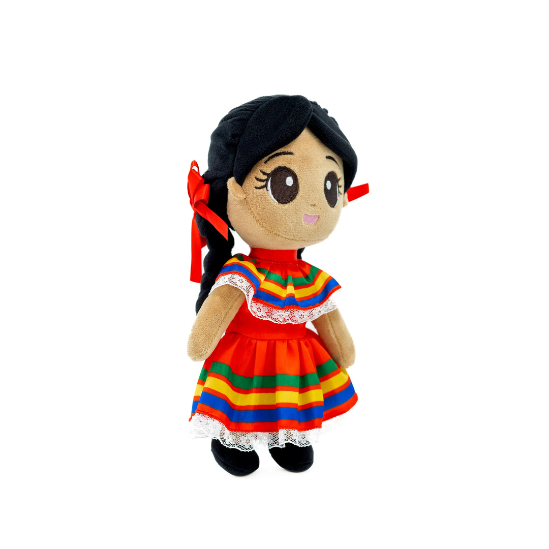 A plush doll with braided black hair, wearing a colorful striped dress with lace trim, holding a red bow.