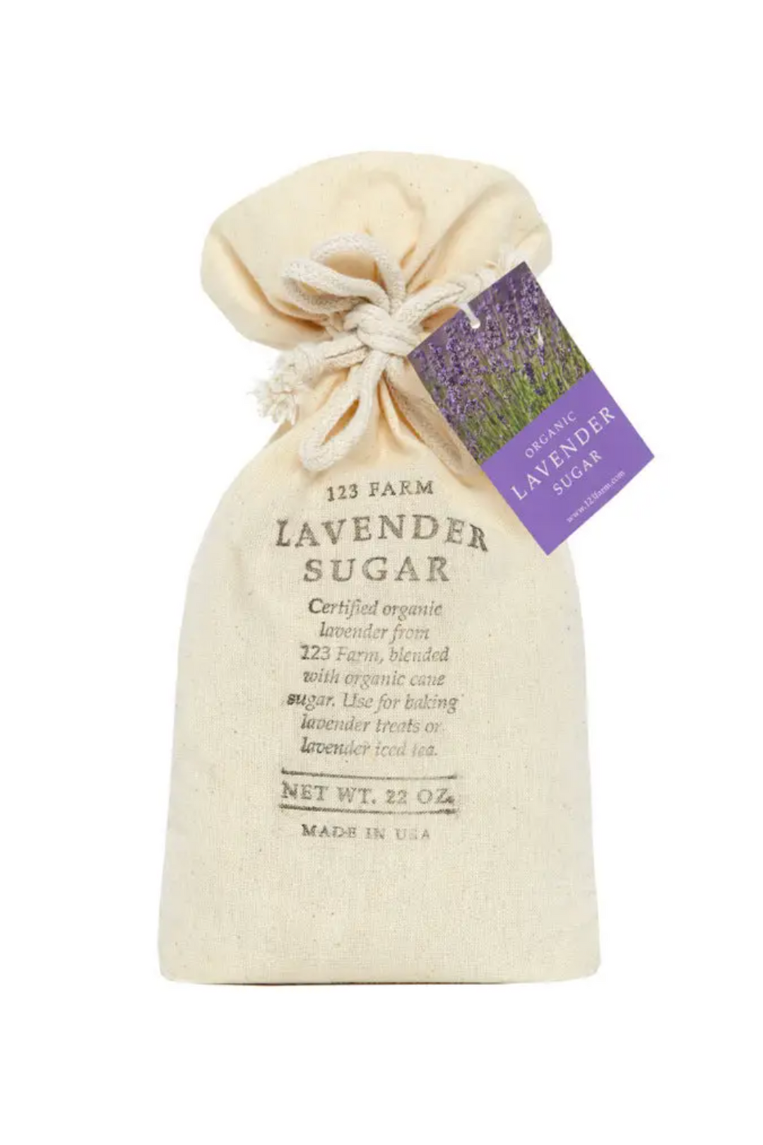 Organic lavender-infused sugar in cream-colored cloth sack with purple lavender field image and product information.