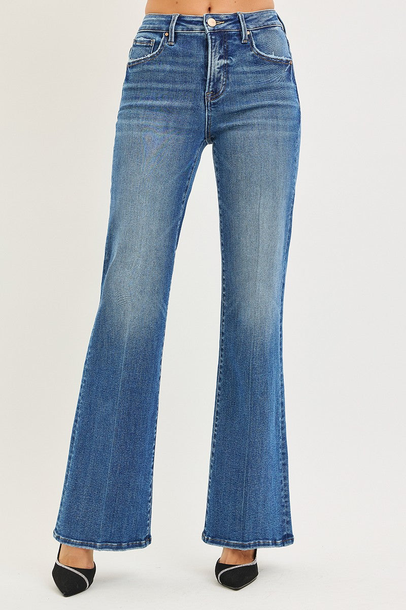 High-rise denim jeans with a wide, flared leg silhouette in a medium blue wash.
