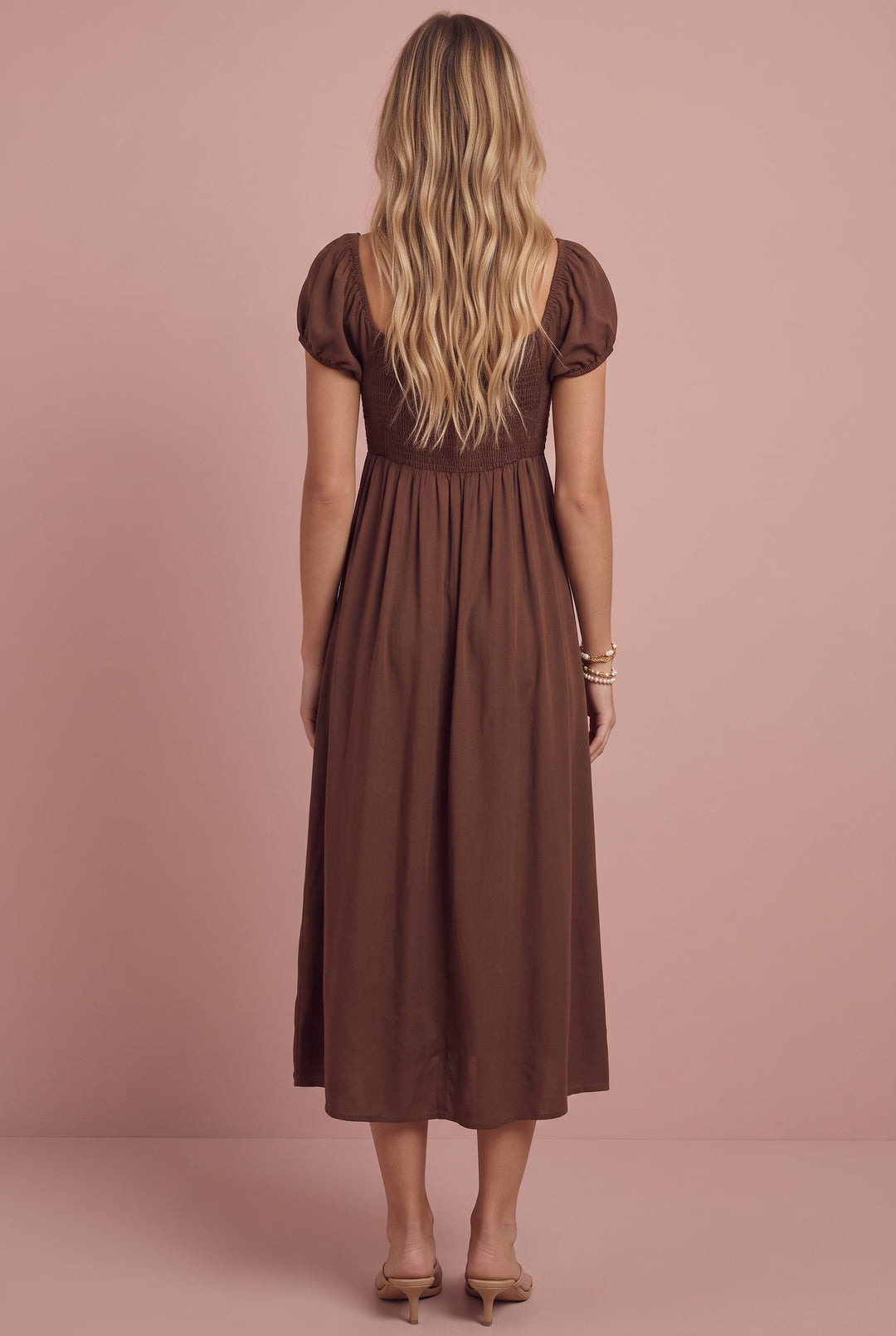 Wendy Smocked Midi Dress in brown, back view on model with blonde hair.