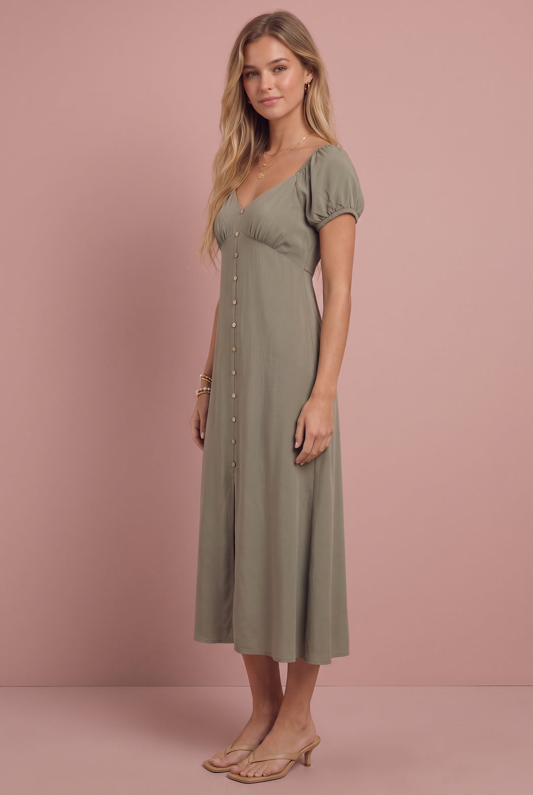 Wendy Smocked Midi Dress in sage green, front view, on model wearing neutral sandals.