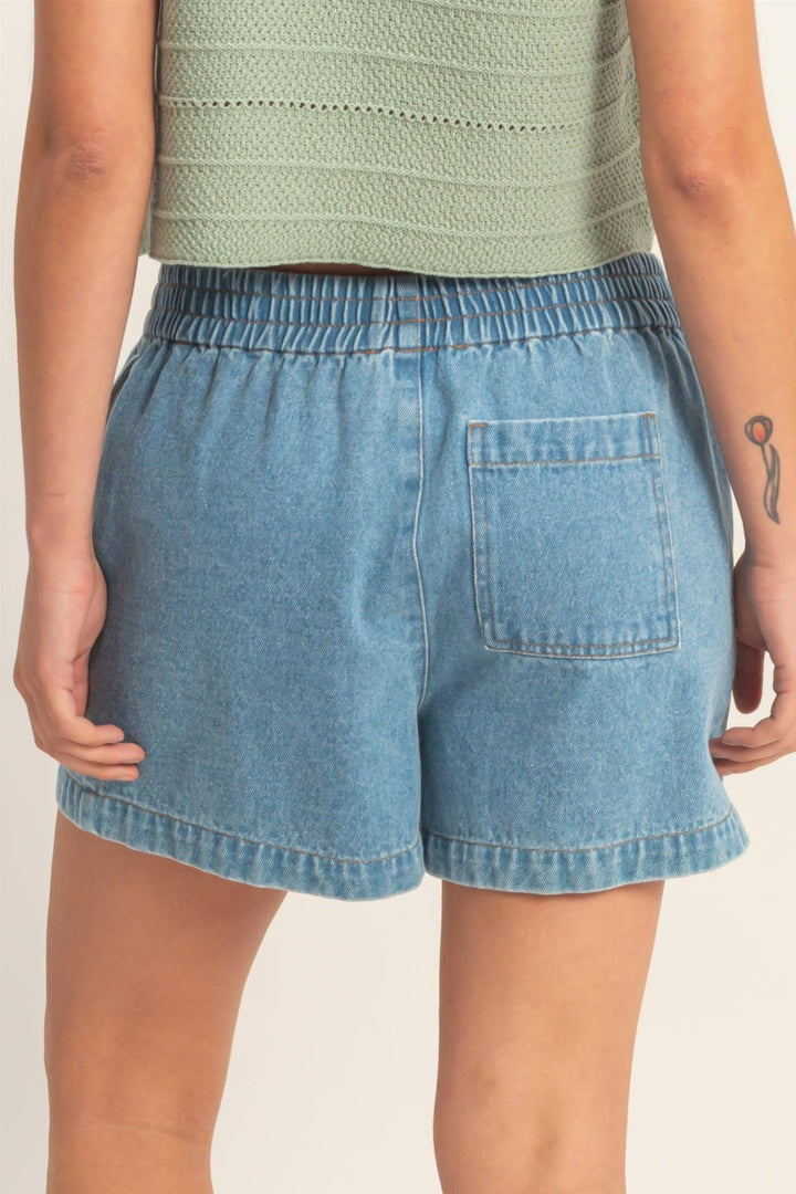 Light blue denim shorts with an elastic waistband and front pockets.