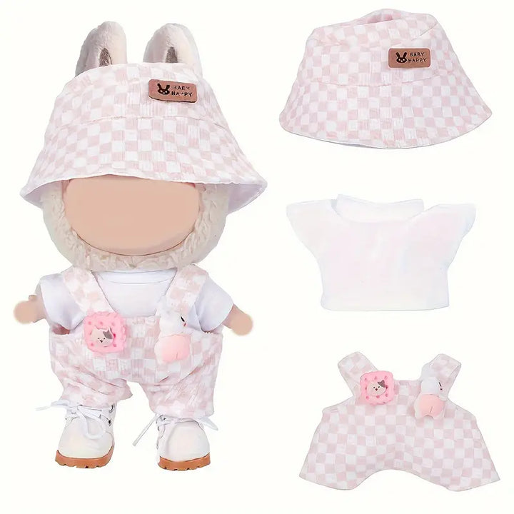 Plush doll wearing pink-and-white checkered overalls and matching bucket hat, with flower and heart details.
