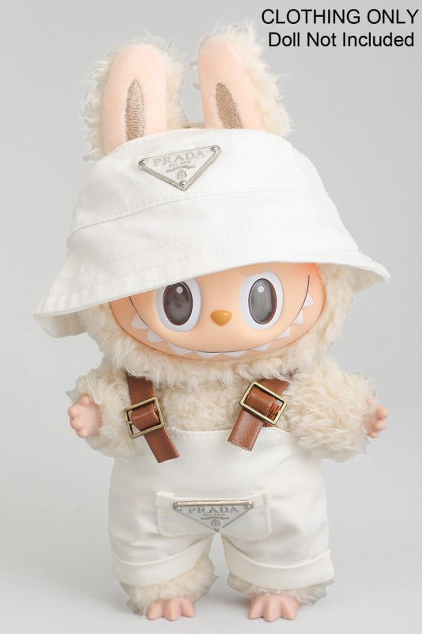 Soft, plush white Labubu doll wearing Prada-branded white overalls and matching bucket hat with Prada logo.