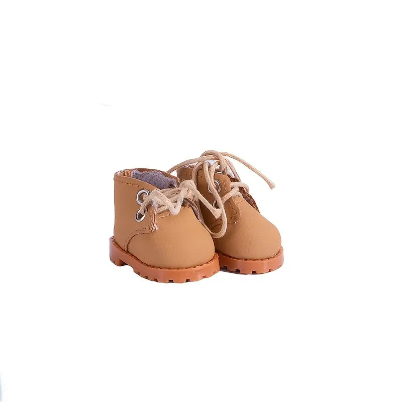 Pair of tan Timberland-style lace-up boots with thick traction soles and warm lining.