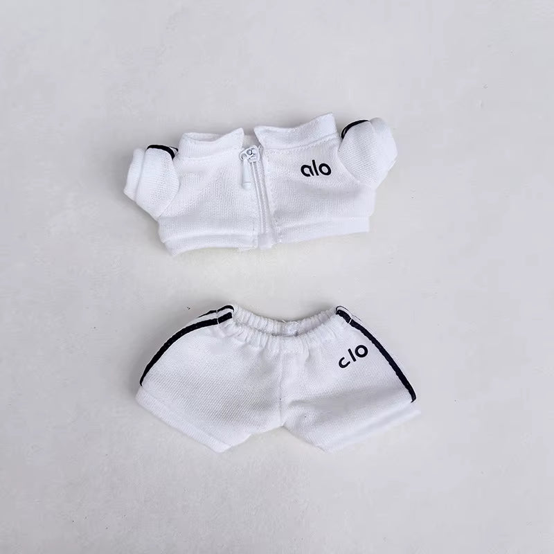 White sports set with zippered jacket and matching shorts, featuring the "Alo" logo.