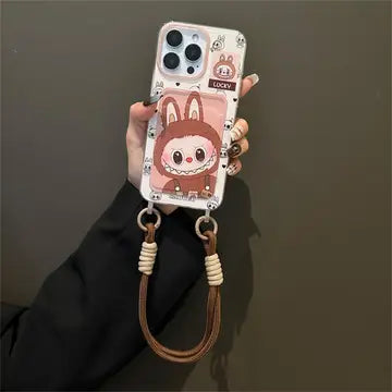 A pink and white phone case featuring a cute Labubu character, with a small attached bag or strap.