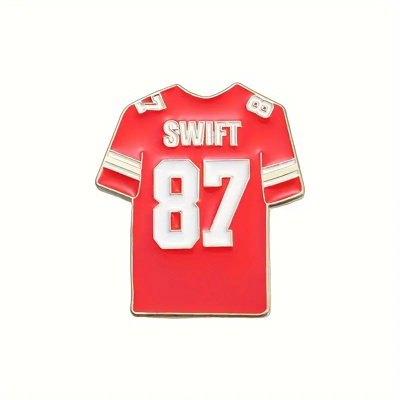 Red jersey-style enamel pin with the name "SWIFT" and number "87" in white lettering.