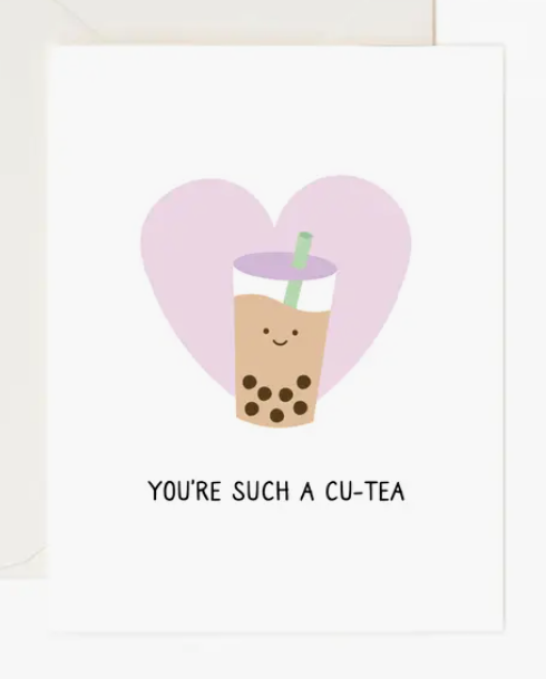 A pink heart shape surrounds a cute cartoon image of a boba tea drink, accompanied by the text "You're such a cu-tea".